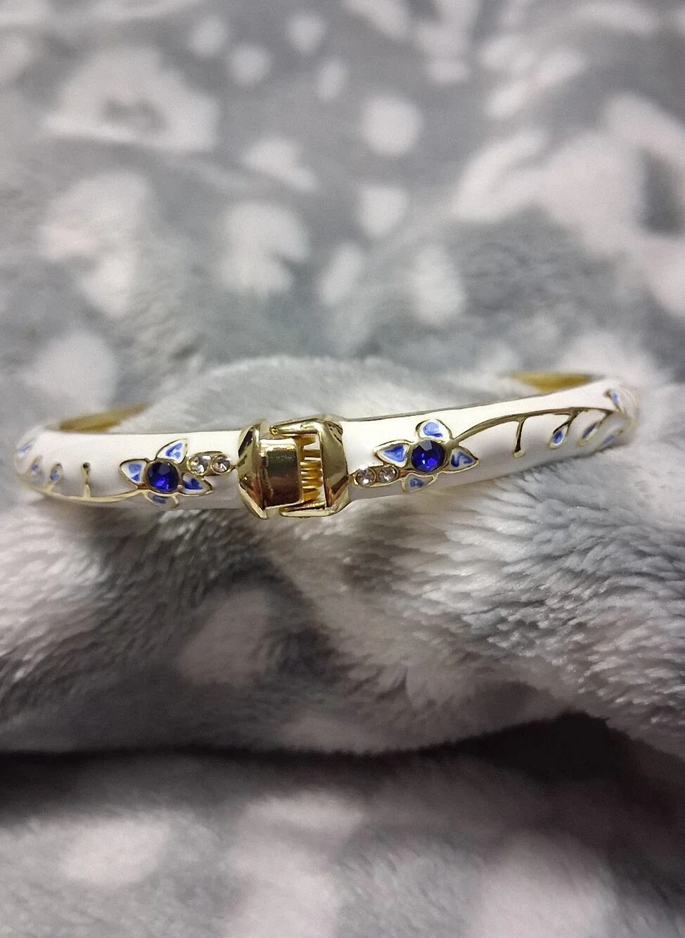 Elegant White Enamel Bangle Bracelet with Blue Floral Accents